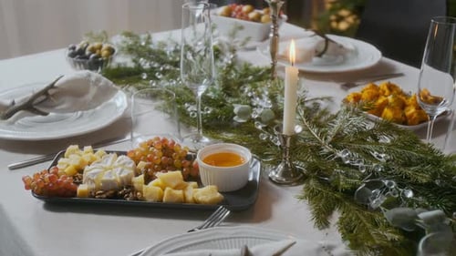 Christmas Table Setting with Food and Decorations