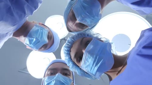 Medical Team Over Patient in Operating Room