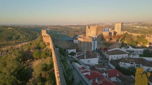 Drone Stone Fortification Walls in Medieval Village at Sunset Ancient Fortress