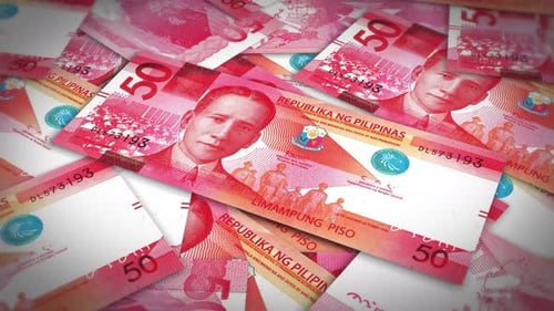 Pile of philippines peso cash money, inflation concept. Closeup new philippines fifty peso bills 4k