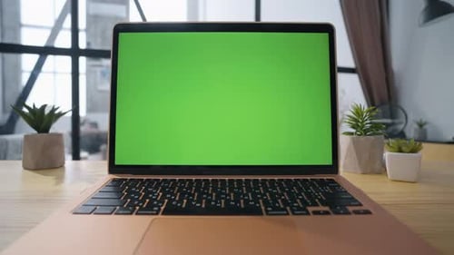 Laptop with Chroma Key Being Typed On