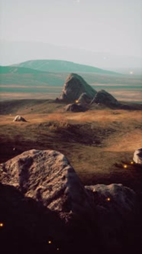 Massive Rock Standing in Field
