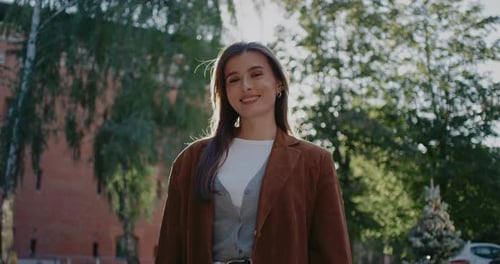 Camera Moving Closer to Charming Caucasian Girl with Beautiful Smile Woman Looking Directly at