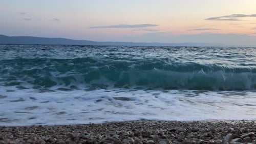 Pebble Sea Beach at Sunrise Breaking Waves at Sunset Seascape Ocean Coastline