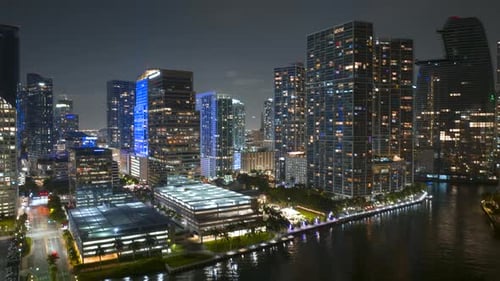 Miami Brickell in Florida USA Night Cityscape of Brightly Illuminated Shiny Skyscraper Buildings in