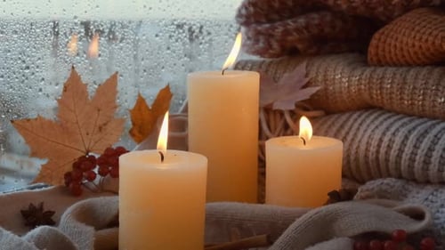 Candles, Sweaters, and Rain on a Cozy Autumn Day