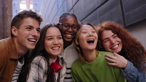 Multiracial Student People Hugging Looking Excited Together Enjoying at University Campus