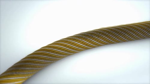 Primer plano de un cable retorcido amarillo y gris