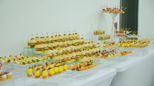 Banquet Table with Appetisers Catering in Restaurant Move Camera Shot