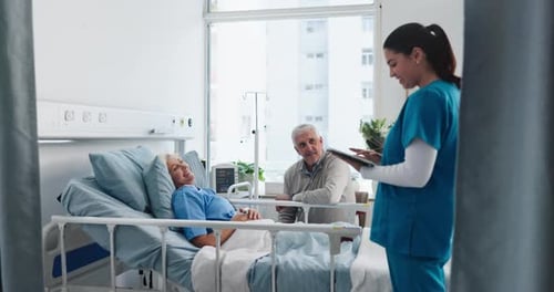 Nurse, tablet and consulting with senior couple in hospital with patient for healthcare