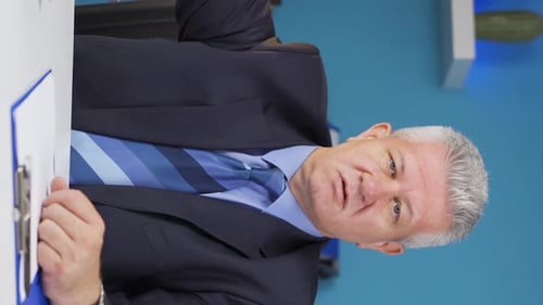 Business Man Explaining Corporate Strategy in Vertical Video