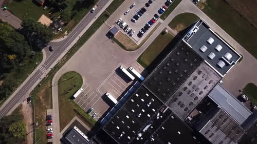 Aerial View of Modern Industrial Warehouse and Logistics Parking Hub