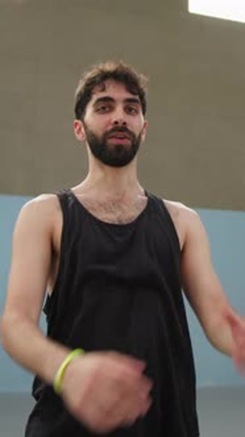 Boy Breathes After The Game In The Basketball Court