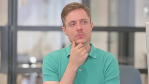 Portrait of Mature Adult Man Brainstorming New Idea