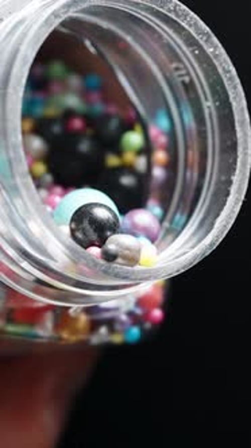 Colorful Sprinkles Pouring Out of Container