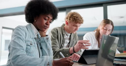Education, study group and tablet with student friends in library of college or university together