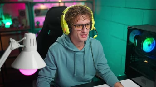 Young Adult Playing Video Game Online