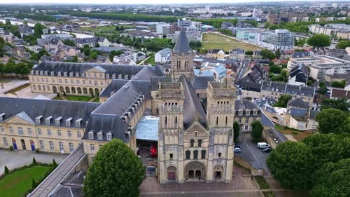Ladies Abbey of Sainte-Trinité with Michel D'Ornano park in background, Caen, France. Aerial drone t