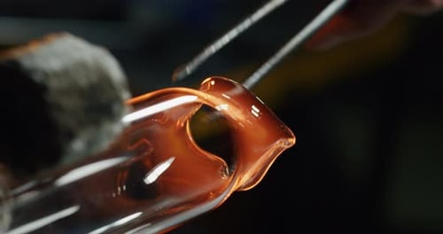 Shaping Molten Glass with Tools Close Up