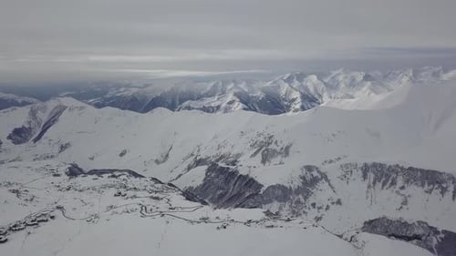 Wide Aerial Panorama of Snowy Mountain Ridge on Winter Sunrise Stunning Mountains Range Covered with