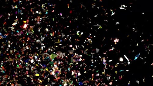 Colorful Confetti Falling on Black Background