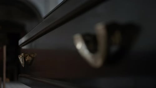 Two Handles on Wall of Coffin in Cathedral