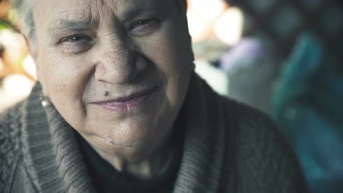 pensive sad woman looking at camera,close up