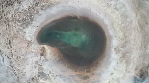 Spinning Geothermal Hot Spring Pool Bubbling Turquoise Water. In Hveravellir Iceland Drone Moves