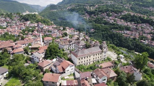 Aerial: Jajce Kasarna, Sarajevo, nestled amid green hills. Bosnia
