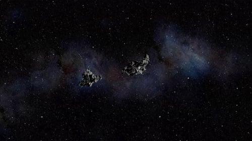 Two asteroids collide in space