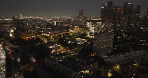 a city at night with many buildings