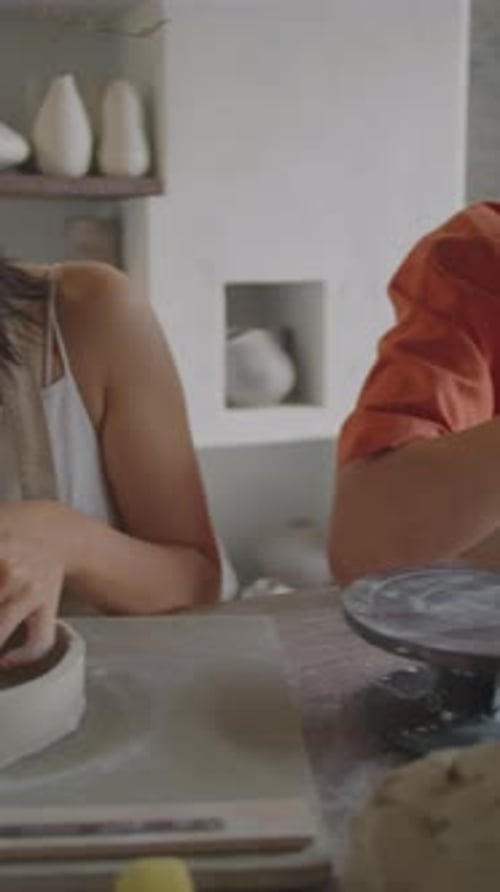 Young Adults Working with Clay