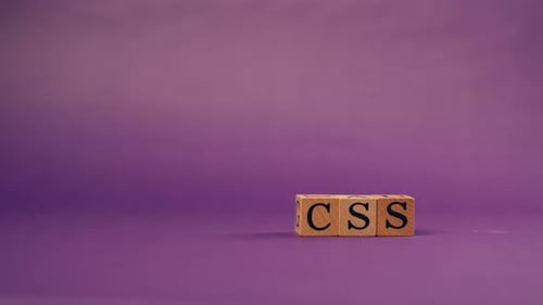 Purple Warm Background with Shadows Wooden Cubes with Black Letters and Laid Out Words From Letters