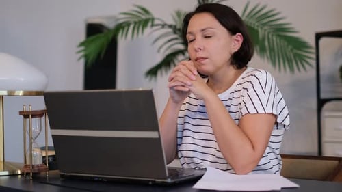 Frustrated Businesswoman Works at Computer From Home Woman Entrepreneur Upset Stressed Typing at the