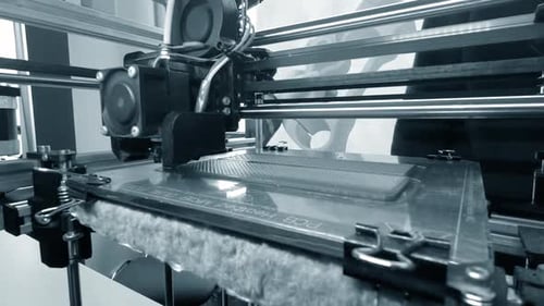 3D Printer Creates New Object in Workshop