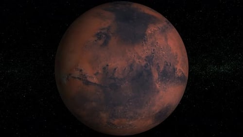 planet Mars rotating in space, the red world in front of the stars,