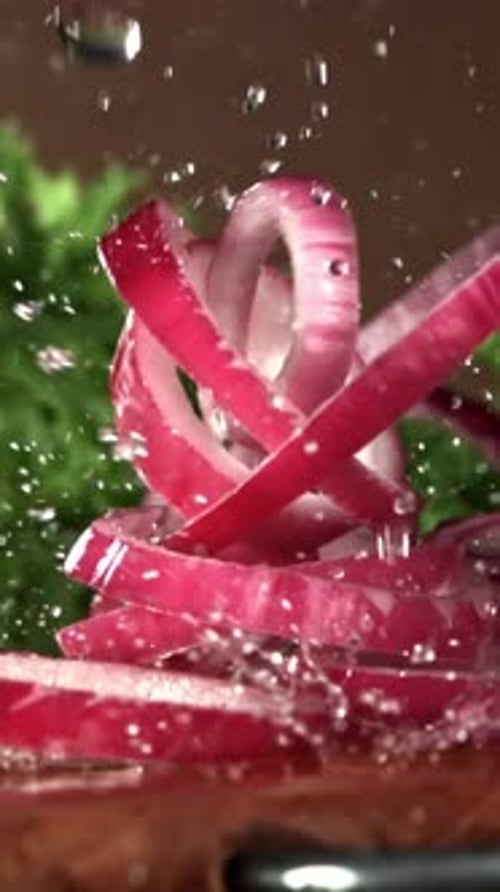The Chopped Onion Falls Onto the Cutting Board Filmed on a Highspeed Camera at 1000 Fps