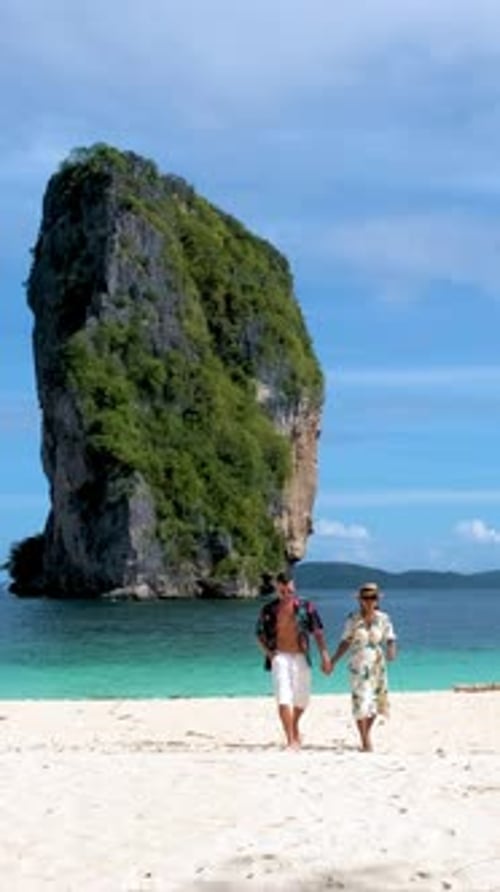 Koh Poda Krabi Thailand an Asian Woman and a European Man on a Beach in Thailand