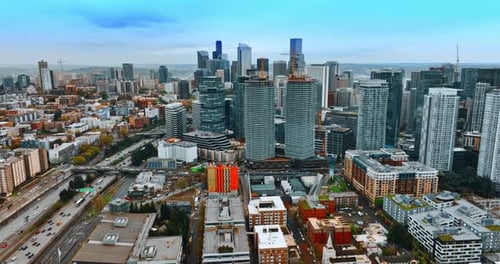 Downtown of Seattle, Washington, USA at daytime. Drone approaching the high-rise buildings