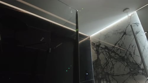 Explore Modern Interior Design Focused on Elegant Lighting and Gorgeous Glass Features