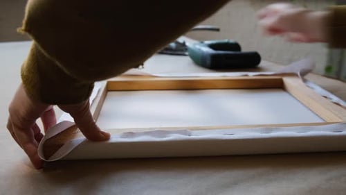 Securing Canvas on Wooden Frame with Staple Gun