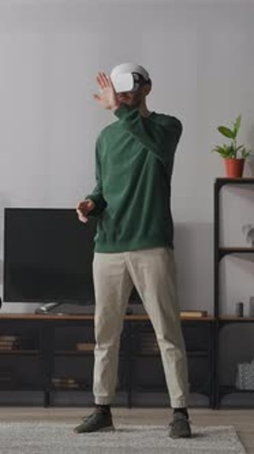 Man Using Virtual Reality Headset in Modern Living Room