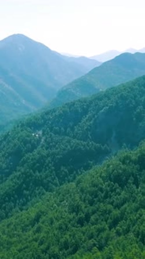 Top View of Beautiful Green Mountain Scenery Clip Beautiful Mountain Valleys with Green Cover on Sky