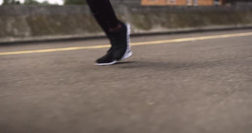 4k video footage of an unrecognizable man running in the city