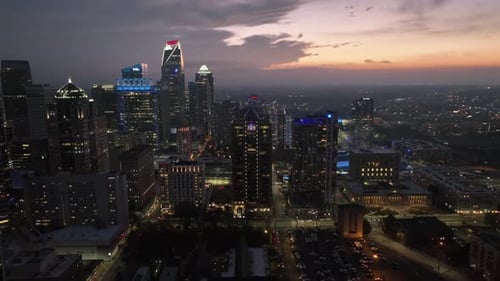 City Skyline Aerial at Dusk with Towering Buildings
