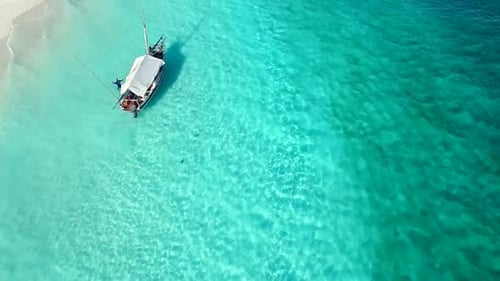 Traditional Fishing Boat Moored Near Shore Aerial Topview