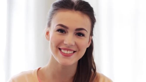 Smiling Young Woman Close-Up Portrait Indoors, Happiness