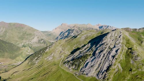 Aerial View Flying Over Stunning Green Mountain Landscape