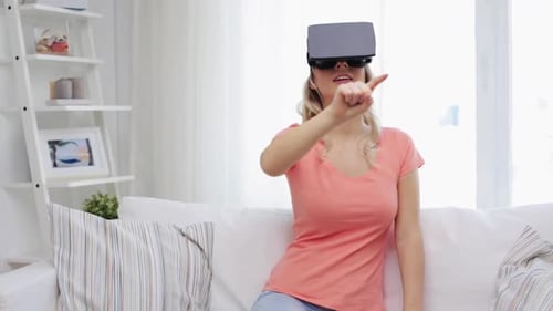 Technology Cyberspace Entertainment Gaming and People Concept - Happy Young Woman With