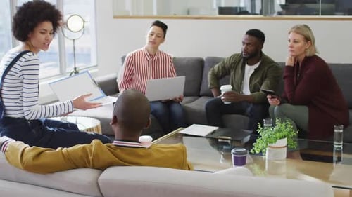 Diverse group of male and female business colleagues working in office
